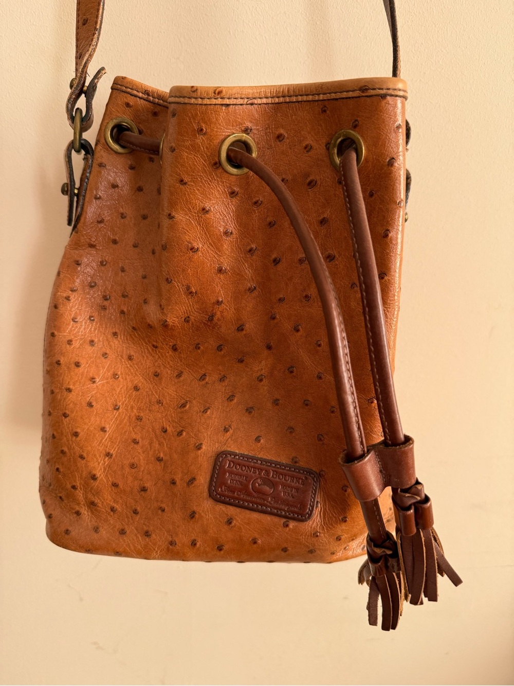 Dooney & Bourke Cognac Ostrich-Effect Drawstring Shoulder Bag